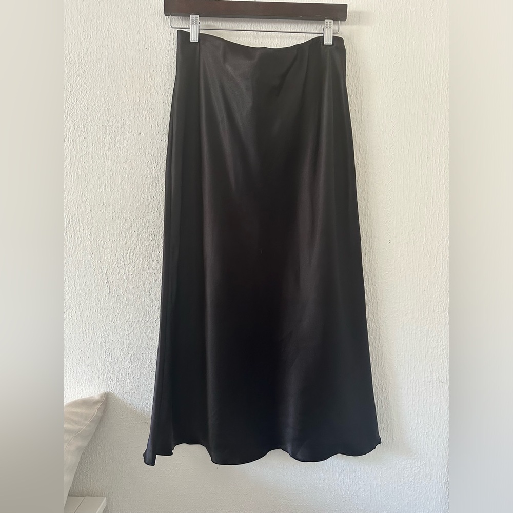 LBisse Black Skirt 100% polyester with satin like feel and shine.